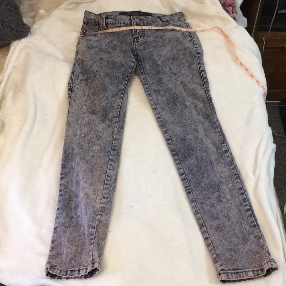 Purple/bleached distressed looking jeans. Size 5/6